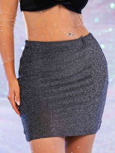 Features Of Grey Glitter Skirt 💖PENCIL SKIRT DESIGN: This grey glitter skirt features a classic pencil skirt shape with a flattering but not overly tight skirt, perfect for accentuating the curves of your figure while remaining elegant.💖MINI LENGTH VERSATILITY: The mini length of the sequin skirt is not only suitable for everyday wear, but also for work environments, able to easily transition from workplace to evening party look, enhancing the practicality and multi-occasion applicability of the skirt.💖ELASTIC WAIST DESIGN: The elastic waist design is easy to put on and take off, providing better comfort and adaptability for a wide range of body types.💖Versatile grey with sequin embellishment: the classic grey tone with tiny glitter sequins makes this sequin skirt understated but witho Trendy Shiny Skirt For Night Out, Elegant Mini Bottoms For Party Season, Elegant Mini Length Bottoms For Party Season, Shiny Fitted Skirt For Party Season, Fitted Shiny Skirt For Party Season, Trendy Fitted Shiny Mini Skirt, Trendy Fitted Shiny Skirt, Trendy Pencil Skirt For Party, Trendy Silver Skirt For Party