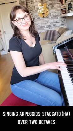 a woman sitting on the floor with a piano in front of her and text reading singing appeos staccato ha over two octaves