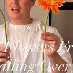 a man holding a flower with the words how to flowers for nailing over it