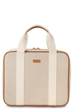 A roomy cosmetics case with top-carry handles and four removable compartments makes organizing bathroom essentials easy. Top zip-around closure   Carry handles   Four removable compartments   60% recycled polyester, 40% recycled preconsumer cotton   Wipe with damp cloth   Imported Cream Rectangular Cosmetic Bag For Travel, Rectangular Cream Travel Cosmetic Bag, Beige Rectangular Luggage For On-the-go, Functional Beige Rectangular Luggage, White Cosmetic And Toiletry Storage For Travel, Organizing Bathroom, Stephanie Johnson, Bathroom Essentials, Makeup Case