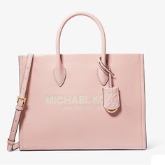 Crafted From Pink Pebbled Leather In A Structured Silhouette, This Michael Kors Mirella Tote Bag Features Stamped/Engraved “Michael Kors“ Lettering And Polished Golden Hardware For An Ultra-Luxe Finish. With Smooth Leather Accents And A Roomy Interior, Along With Frontal Mk Charm That Slides Up Into A Leather Pocket. Interior Also Includes A Zip Pocket Inside As Well As An Open Pocket. This Bag Is Brand New And Never Used.. Pristine Condition, Perfect, Beautiful, And Stunning! Tote Bag Pebbled L Michael Kors Textured Leather Satchel For Everyday Use, Michael Kors Top Handle Satchel For Daily Use, Luxury Michael Kors Textured Leather Bag, Michael Kors Rectangular Textured Leather Bag, Michael Kors Leather Bags With Double Handle, Michael Kors Leather Bag With Detachable Handle, Classic Michael Kors Textured Leather Bag, Michael Kors Bags For Errands, Chic Michael Kors Satchel For Shopping