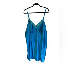 All Orders Ship Within The Next 1-3 Business Days! Cacique Blue With Green Lace Sexy Chemise Nightie Woman’s Plus Size 22/24 Condition: Brand New With Tags! Color: Teal Blue And Green Size: 22/24 Measurements Are Approximate Armpit To Armpit- 24" Shoulder To Hem- 40" 100% Polyester Smoke Free Home! Questions Are Welcome! Accepting Best Reasonable Offers Thank You For Stopping By My Closet Blue Chemise For Summer Nights, Blue Chemise For Sleep In Summer, Blue Chemise For Summer Sleepwear, Blue Summer Night Chemise, Blue Spaghetti Straps Sleepwear, Blue Summer Chemise For Sleep, Summer Night Blue Chemise, Blue Summer Sleep Chemise, Green V-neck Nightgown For Sleep