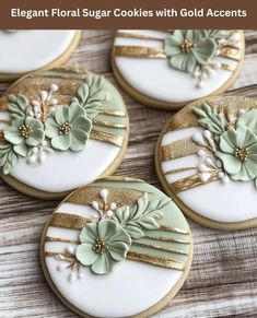 four decorated sugar cookies with gold accents and flowers on them, sitting next to each other