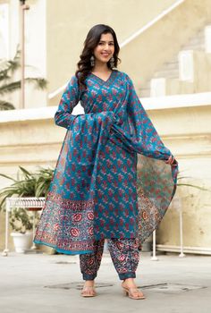 Grab this beautiful 3-piece set. The set comes with straight cut block print kurta has v neck, 3/4th sleeves & calf length teamed with matching bottom and a chanderi cotton dupatta to match. Color - Blue Kurta Fabric-Viscose Pant Fabric-Viscose Dupatta Fabric- Chanderi Cotton Neck-V Neck Sleeves-3/4th Sleeves Work - Block Print Detailing Washing Instructions-Dry Clean Model Height - 5.5 wearing size small. DISCLAIMER - The color of the product may be differ due to screen settings of device. A misprint here and a colour drop slip there is the beauty of printing which is not treated as a defect. Bohemian Chanderi Palazzo Set With Long Sleeves, Bohemian Long Sleeve Chanderi Palazzo Set, V-neck Chanderi Sets For Diwali, V-neck Palazzo Set With Printed Motifs For Eid, Festive Floral Print V-neck Palazzo Set, Festive V-neck Floral Print Palazzo Set, Bohemian Semi-stitched Palazzo Set With Long Sleeves, Bollywood Style V-neck Sets With Printed Motifs, Bohemian Semi-stitched Long Sleeve Palazzo Set