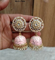 Dark Gold  jhumka earrings set. Earrings length: 2.9 inches  (with drops)  Stud diameter- 1.2 inches Dome Size: 1.1 inches Pink Round Danglers For Wedding, Pink Kundan Dangle Bridal Earrings, Pink Jhumkas Drop Earrings For Wedding, Pink Jhumkas For Wedding, Pink Meenakari Jewelry For Eid, Bollywood Style Pink Dangle Earrings, Traditional Pink Chandbalis With Cutdana, Bollywood Pink Wedding Earrings, Pink Bollywood Earrings For Wedding