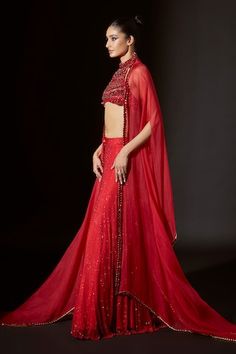 Red silk organza cape with crystal embellishments. Comes with net sharara and a crop top with big stone work. - Aza Fashions Red Mirror Work Palazzo Set For Wedding, Red Palazzo Set With Mirror Work For Wedding, Fitted Red Palazzo Set With Sheer Dupatta, Red Traditional Drape Palazzo Set For Celebration, Red Palazzo Set With Sheer Dupatta For Party, Red Palazzo Set For Celebration With Traditional Drape, Red Palazzo Set For Celebration, Red Georgette Lehenga For Evening, Red Palazzo Set With Mirror Work For Party