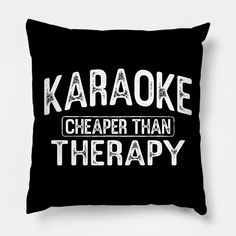 a black pillow with the words karaoke cheaper than therapy printed in white on it