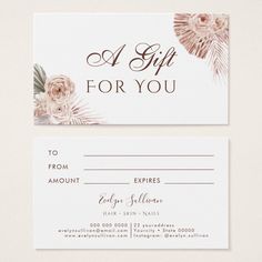 a gift for you card with pink flowers and greenery on the front, in gold foil