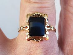 Fresh from an estate this spectacular 10k rare 1940s Edwardian era Art Deco style Gothic look rectangle onyx ladies ring. This is an original antique Edwardian era Art Deco style ladies rectangle shaped onyx ring with a greay Gothic look. Ring is stunning and has very intricate gold work. Onyx in center measures about 10 mm high X  8 mm wide. Stamped with 10k mark inside as shown. Ring is a US size 9 1/2. Ring weights 3.58 grams. Some dings and dents on ring and stone from age but stunning nonet Victorian Rectangular Polished Jewelry, Formal Victorian Jewelry With Rectangular Shape, Rectangular Victorian Jewelry For Formal Occasions, Vintage Rectangular Jewelry With Polished Finish, 14k Gold Rectangular Jewelry For Evening, Formal Victorian Rectangular Jewelry, Antique Rectangular Jewelry For Formal Occasions, Antique Rectangular Formal Jewelry, Victorian 14k Gold Rectangular Jewelry