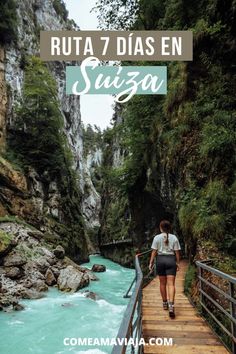 a woman walking down a wooden bridge over a river with the words ruta 7 dias