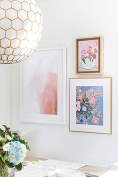 asymmetrical trio gallery wall above breakfast nook Breakfast Nook Artwork, Breakfast Nook Gallery Wall, Wall Picture Collage Ideas, Wall Picture Collage, Picture Collage Ideas, Ocean Bedroom