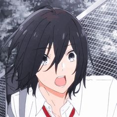 an anime character with black hair and blue eyes