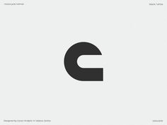 the letter c is made up of black and white letters on a light gray background