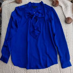 New With Tag Size Medium Tall Royal Blue Color May Vary In Person Tie-Neck Blouse Three Button Placket Shoulder Details Hard To Find! Model Wearing Similar Style Royal Blue Tie, Top Banana, Tie Neck Blouse, Royal Blue Color, Blue Ties, Tie Neck, Button Placket, Hard To Find, Neck Tie