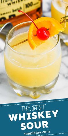 the best whiskey sour recipe is in a glass with a cherry garnish on top