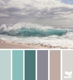 the color scheme for this beach wedding is blue, green and gray with white waves