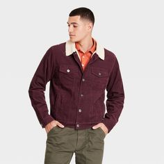 Keep your off-duty look warm and stylish with this Faux-Shearling Lined Denim Trucker Jacket from Goodfellow & Co™. Tailored in a casual fit, this denim trucker jacket in grape purple sports a classic collared neckline with front buttons, French cuffs and buttoned flap pockets and side pockets for functional style. The heavyweight fabric with faux-shearling lining offers cozy comfort, and you can layer it over a range of outfits buttoned up or down to create a variety of looks. Goodfellow & Co™: Fall Denim Jacket With Corduroy Collar, Denim Jacket With Faux Fur Lining For Fall, Casual Fall Outerwear With Corduroy Collar, Casual Sherpa Outerwear For Fall, Casual Outerwear With Corduroy Collar For Fall, Casual Denim Jacket With Faux Fur Lining For Winter, Fall Denim Jacket For Cold Weather, Casual Winter Denim Jacket For Work, Long Sleeve Denim Jacket For Cold Weather In Fall