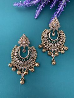 Polki chandbali with gold drops . About 4 inch long and 2inch wide . Push back , light weight, antique base and champagne polki . Metal Chandbali Chandelier Earrings With Intricate Design, Metal Chandelier Earrings With Intricate Design For Festivals, Metal Chandbali Danglers With Intricate Design, Elegant Metal Chandbalis With Intricate Design, Elegant Metal Chandbalis For Festivals, Elegant Chandbalis With Latkans For Celebration, Intricate Design Metal Chandbalis Drop Earrings, Intricate Metal Chandbalis Drop Earrings, Metal Chandbalis With Intricate Design