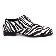 a zebra print shoe with black laces