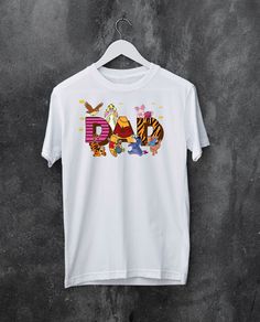 Keywords: Winnie The Pooh And Friends Dad Shirt, Funny Fathers Day T-shirt, Disneyworld Dad Sweatshirt, Disneyland Magic Kingdom Tee, Best Gift for Dad Design Color Option: White, Black, Pink, Light Blue, Royal Blue, Purple, Yellow, Orange, Hot Pink, Gold Metalic, Silver, Rose Gold, Glitter Gold, Glitter Silver, Giltter Rose Gold, Glitter White and Glitter Black ❤❤ SHIRT INFO❤❤ Our t-shirts are SUPER  soft and SUPER comfy. Sleeves are only rolled for the picture.  Solid Colors: 100% combed and r Disney Cotton T-shirt With Cartoon Print, Disney Short Sleeve T-shirt With Letter Print, Fun T-shirt With Letter Print For Disney Fan Events, Disney Short Sleeve Letter Print T-shirt, Fun Letter Print T-shirt For Disney Fan Events, Disney Letter Print Cotton T-shirt, Cotton T-shirt With Letter Print For Disney Fans, Winnie The Pooh And Friends, Pooh And Friends