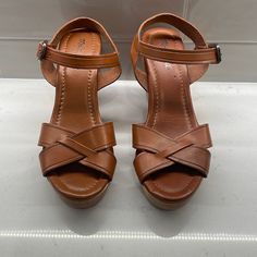 Madewell Wooden Platform Sandals. New W/Out Tags. Never Worn, Excellent Condition. Brown Leather Upper With Wooden Platform Bottom. Sole Is Man Made Material. Made In Italy. 4” Total (1”Platform With 3” Rise) Brown Wedge Heel Sandals With Padded Heel, Wooden Platform Sandals, Madewell Shoes, Flip Flop Shoes, Brown Sandals, Flip Flop, Platform Sandals, Women's Shoes Sandals, Madewell