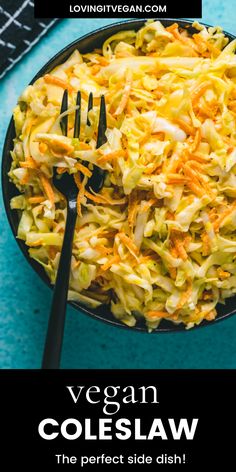 a bowl filled with coleslaw on top of a blue table