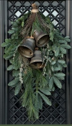 a wreath with bells hanging from it