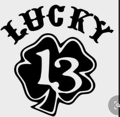 an image of lucky 13 with the number thirteen in black on a white paper background