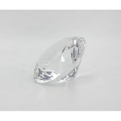 an oval cut diamond on a white background