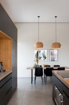 the kitchen is clean and ready to be used as a dining room or office space