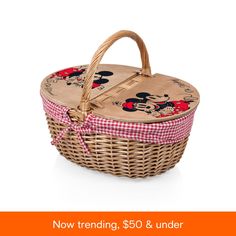 a wicker basket with mickey mouse designs on it and the words now trending $ 50 & under