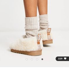 Brand New Ugg Fuzzy Shearling Boots Size 10. Style Is Sold Out In This Size!! Please Do Not Send Lowballs :) I Am Fine Keeping Them. Genuine Shearling Boots Cute Ugg Logo On Back Perfect Cream White Color That Goes With Everything!! Black Ugg Slippers, Ugg Sweater Boots, I Am Fine, Ugg Boots Classic Short, Ugg Winter Boots, Cream White Color, Black Ugg Boots, Ugg Classic Ultra Mini, Bailey Bow Uggs