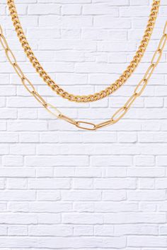 Step up your style game with our 18K Gold Plated Layered Chain Necklace, a statement piece that effortlessly combines elegance and trendiness. This layered necklace features multiple delicate chains, each plated in luxurious 18K gold, creating a stunning, layered look that adds depth and dimension to any outfit. Whether you’re dressing up for a night out or adding a touch of glam to your everyday attire, this versatile necklace is designed to make you shine. Key Features: 18K Gold Plating for a Smart Casual Wear, Layered Chain Necklace, Layered Chain, Versatile Jewelry, Layered Chains, Trendy Necklaces, Gold Necklace Layered, Elegant Necklaces, Layered Necklace