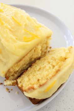 two pieces of cake on a plate with frosting