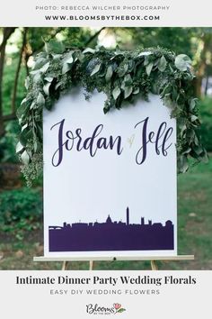 a sign that says, intimate dinner party wedding florals