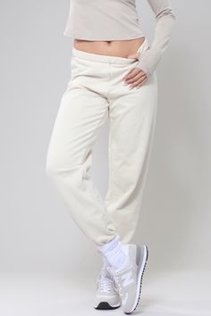 Get ready to bee-lieve in comfort with our Honey Mid-Rise Oversized Joggers. These joggers offer an oversized fit that is perfect for any yoga or fitness routine. The mid-rise design provides a flattering and secure fit, so you can work out with confidence. Don't let anything hold you back, buzz into action with our joggers! Sporty Full-length Spring Joggers, Sporty Full Length Spring Joggers, Loosely Fitted Jogging Sweatpants With Elastic Waistband, Athleisure Joggers With Elastic Waistband For Loungewear, Sportswear Joggers With Elastic Waistband For Loungewear, Relaxed Fit Pants With Elastic Waistband For Jogging, Loosely Fitted Joggers For Loungewear, Oversized Cotton Sporty Joggers, Athleisure Baggy Sweats With Elastic Waistband