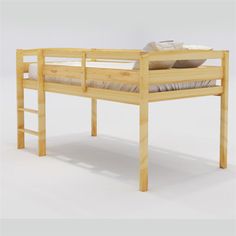 a wooden bunk bed sitting on top of a white floor next to a pillow case