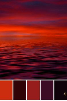 an orange and purple sunset over the ocean