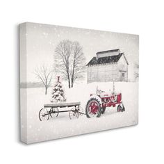 a red tractor parked in the snow next to a white barn with a christmas tree