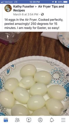 a plate full of eggs sitting on top of a wooden table next to an instagram post