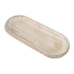 an oval wooden tray with beaded edges on a white background for use as a serving platter