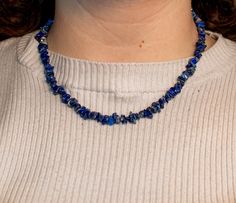 Add an element of zen to your life with your new lapis lazuli chip necklace. This stunning blue crystal necklace will set you apart like nothing else. What a stunningly beautiful, impressive gift to let that special someone know just how important they are to you. DETAILS Your new made to order raw lapis lazuli necklace will consist of natural lapis chip stone beads strung together into an 18 inch long necklace. METAPHYSICAL Lapis lazuli is the December birthstone, making it the perfect gift for Lapis Lazuli Gemstone Crystal Necklaces For Jewelry Making, Lapis Lazuli Gemstone Necklace For Jewelry Making, Blue Lapis Lazuli Necklaces With Stones, Blue Lapis Lazuli Necklace With Stones, Blue Lapis Lazuli Stone Necklace, Adjustable Lapis Lazuli Crystal Necklace, Lapis Lazuli Crystal Necklaces For Jewelry Making, Adjustable Lapis Lazuli Crystal Necklaces With Gemstone, Lapis Lazuli Crystal Necklace For Jewelry Making