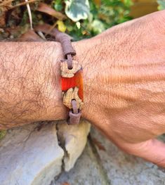 The bracelet made of olive and resin wood .. made of olive wood over 200 years old and processed to the smallest detail in a home workshop..the bracelet is adjustable to each hand Its main color is red sunset,  but other colors are possible .. it is possible to choose the color of the skin Materials : Olive Wood Resin  Your order will be packaged in a beautiful box, ideal for gifts, which is carefully packed for delivery. If you have any questions about this wooden brecelet, please contact me and I will get back to you as soon as possible. Red Sunset, Wooden Bracelet, Wood Bracelet, Home Workshop, Unisex Gift, Gift For Woman, Wood Resin, Unisex Gifts, Olive Wood