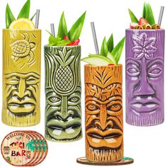 four tiki glasses with different designs on them