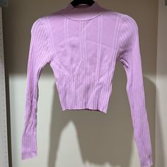 Forever 21 Cropped Long Sleeve Top, Pinky/Lilac, Size Medium. Brand New, Never Worn. Super Stretchy, Ribbed Material. Purple Stretch Long Sleeve Crop Top, Purple Long Sleeve Stretch Crop Top, Trendy Lavender Tops For Winter, Trendy Lavender Winter Tops, Trendy Cropped Purple Tops, Trendy Purple Cropped Top, Fitted Purple Crop Top For Fall, Purple Cropped Top For Spring, Purple Stretch Top For Spring