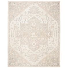 a beige and white rug with an intricate design