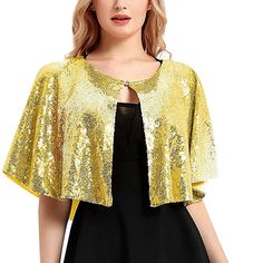 Add a touch of glamour to any outfit with our exquisite Glittering Sequin Shawl. This shoulder shrug features a flowing and elegant short cape, adorned with shimmering sequins in a variety of beautiful hues. With a convenient center closure, it is available in one size that fits all. Elevate your style with this luxurious accessory. material: sequin fabric color: as shown type: short cape one size fits all center closure Elegant Cape For Costume Party, Elegant Cape Sleeve Party Tops, Elegant Party Tops With Cape Sleeves, Elegant Christmas Party Tops, Summer Party Shrug With Stretch, Shimmer Sequin Fabric For Spring Evening, Spring Evening Sequin Fabric With Shimmer, Spring Evening Shimmer Sequin Fabric, Stretch Summer Party Shrug