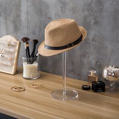 a hat and other accessories on a table