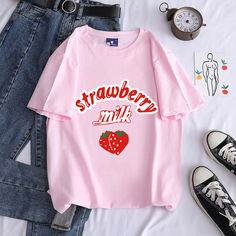 "Yummy Strawberry" TeeCotton MaterialIf you prefer a looser style. please choose a up size.Pro Tip: Asian sizes usually run small compared to American or European sizes. Please make sure to measure yourself. Soft Pink Aesthetic Clothes, Casual White Top With Strawberry Print, Casual Short Sleeve Tops With Strawberry Print, Cute Oversized Slogan Tops, Casual White T-shirt With Strawberry Print, Trendy Strawberry Print Crew Neck Shirt, Trendy Crew Neck Shirt With Strawberry Print, Casual Tops With Strawberry Print In Relaxed Fit, Trendy Strawberry Print Crew Neck T-shirt