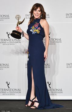 the actress poses with her award for outstanding performance in a musical play at the international television awards